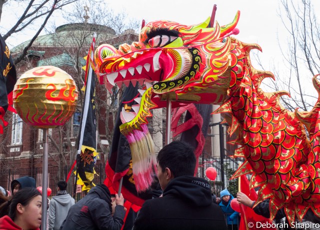 The dragon dances past a synagogue